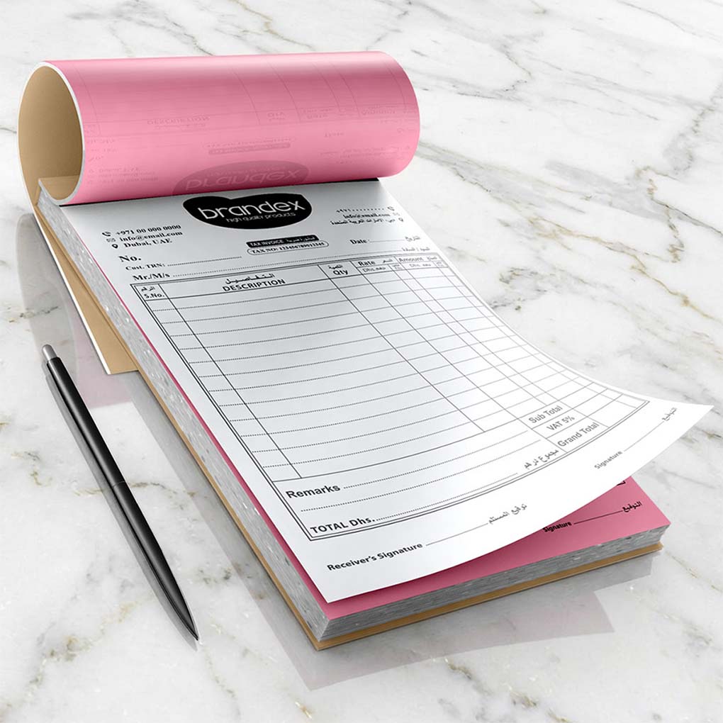 Duplicate NCR invoice book printing in Dubai with customized company details and numbered invoice forms