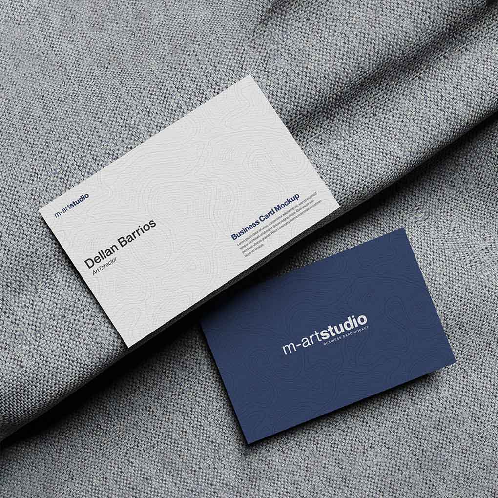 Premium textured white and navy business cards with minimalist design