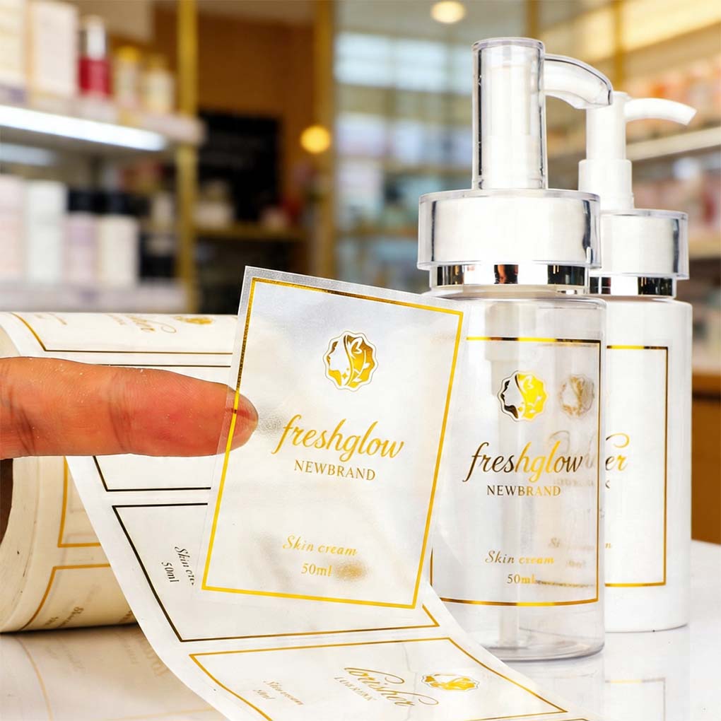 Clear product label sticker printing in Dubai for cosmetic bottles and packaging