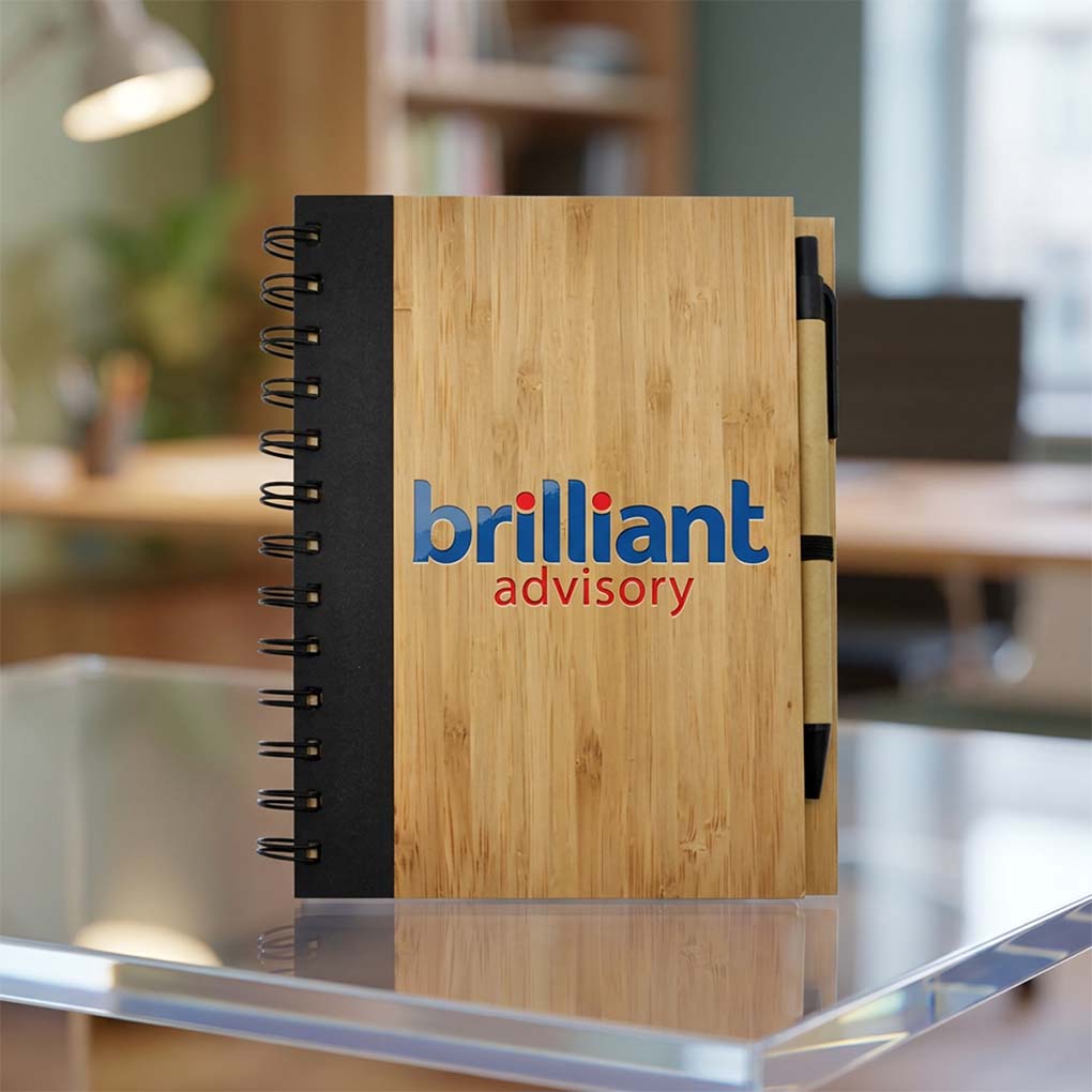Custom bamboo spiral notebook with company logo printing and pen for eco-friendly corporate gifts in Dubai