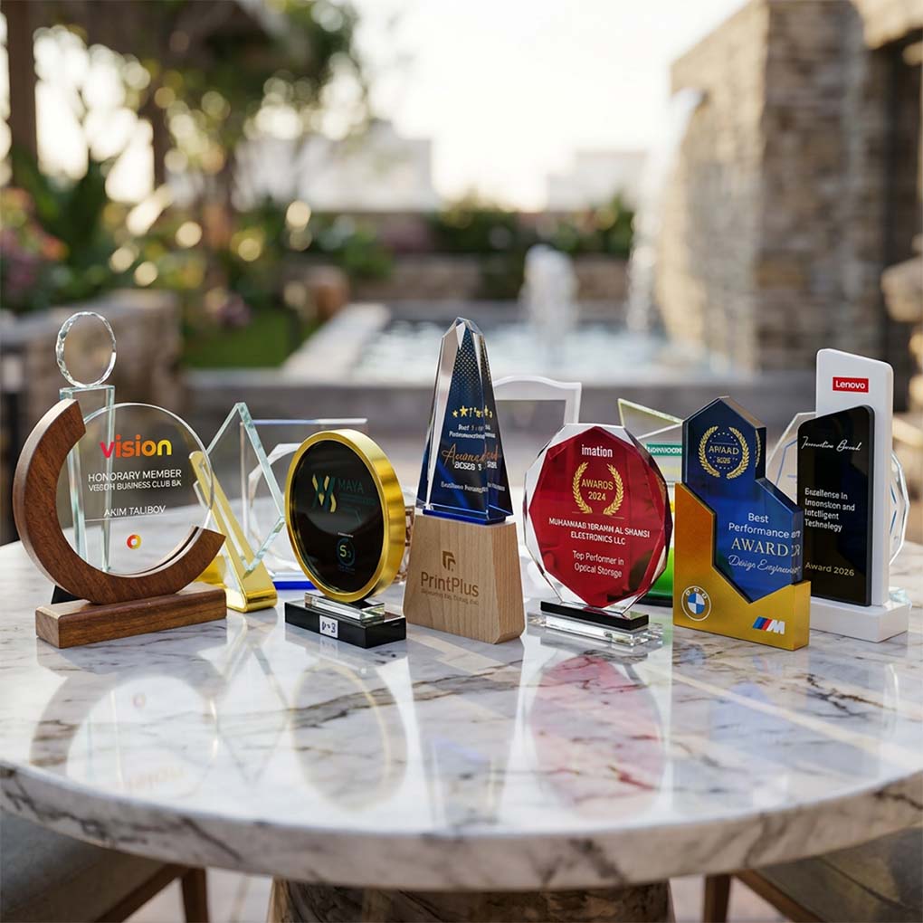 Custom corporate trophies and mementos in acrylic, crystal and wood for awards and events in Dubai