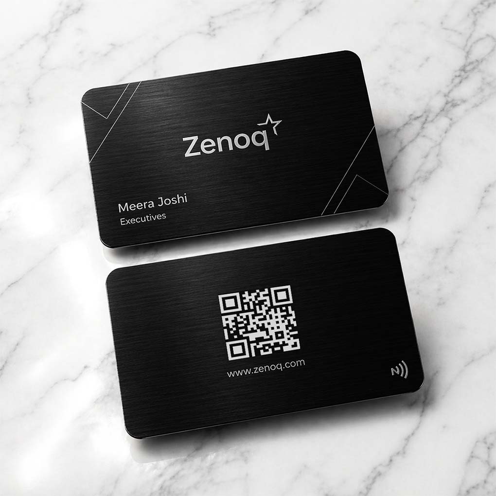 Black metal NFC business card with QR code and contactless tap technology for professionals in Dubai