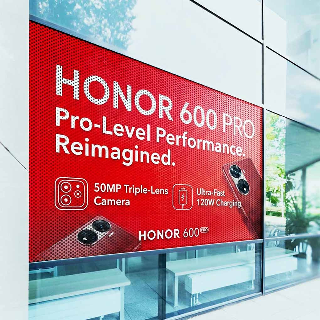 One way vision window printing in Dubai for large format advertising graphics on commercial glass windows