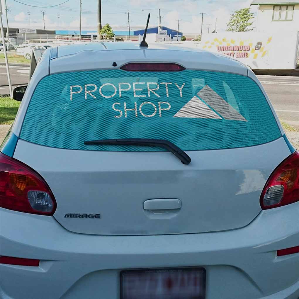 Vehicle rear window one way vision sticker printing for branded car advertising and promotional graphics in Dubai